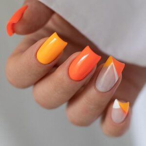 Idealne kolory paznokci do pomarańczowej sukienki – jakie połączenia zachwycą?