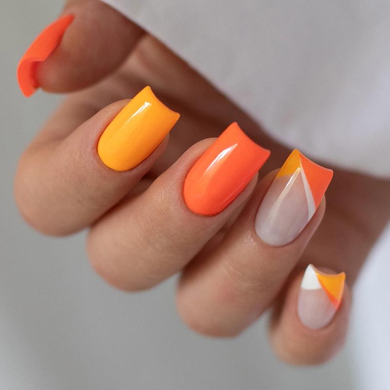 Idealne kolory paznokci do pomarańczowej sukienki – jakie połączenia zachwycą?